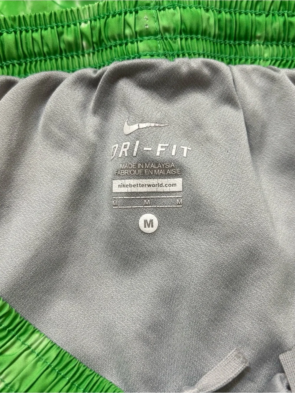 Nike Green Tie-Dye Athletic Shorts with Pink Side Panels